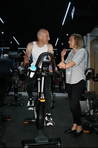 Councillor Moore trying out one of the new CXP Target Training Cycles whilst receiving instruction from Leisure Manager, Corinne Parnall