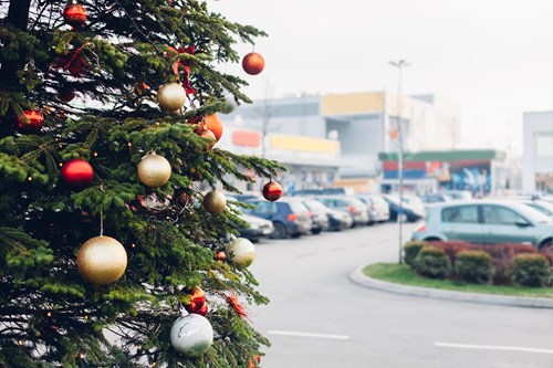 Stock image of Christmas tree in a car park